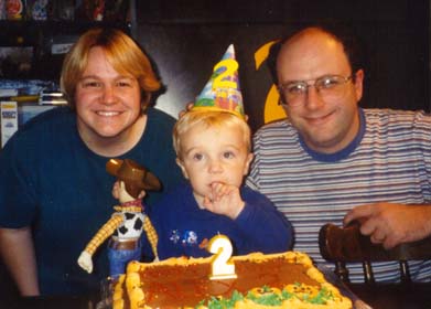 Birthday boy and proud parents