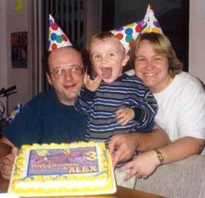 Alex with his proud parents.