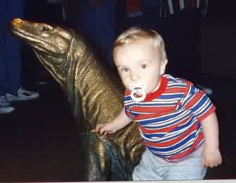 Alexander climbs on a komodo dragon!