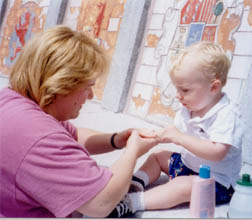 Alex applies sunscreen in New Orleans